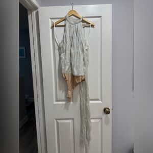 NWT Elegant Silver shimmer exaggerated high neck top